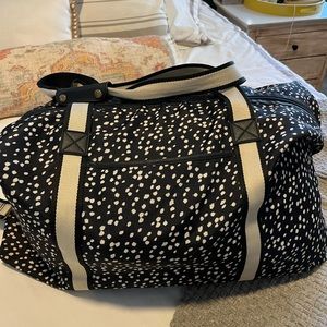 Black and white duffel weekender messenger bag